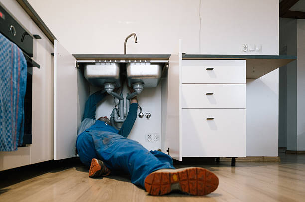 Professional Emergency Plumber technician working in Milton Mills, NH